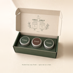 teasis matcha tin box opened — three sealed tins standing in the tray